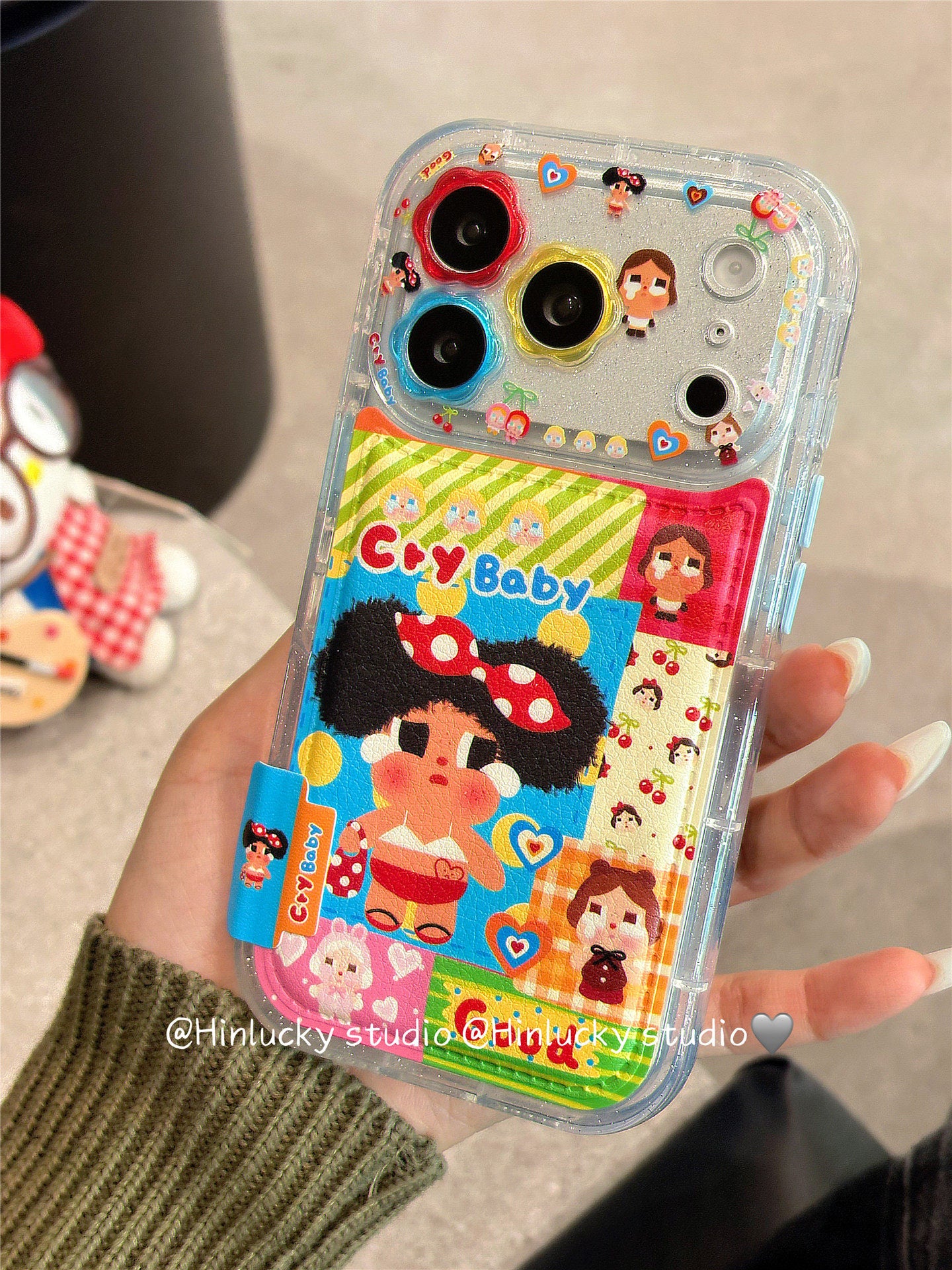 Ameigas Tearful Puff-Pop Case - Cartoon Crying Baby with Floral Leather Camera Accent