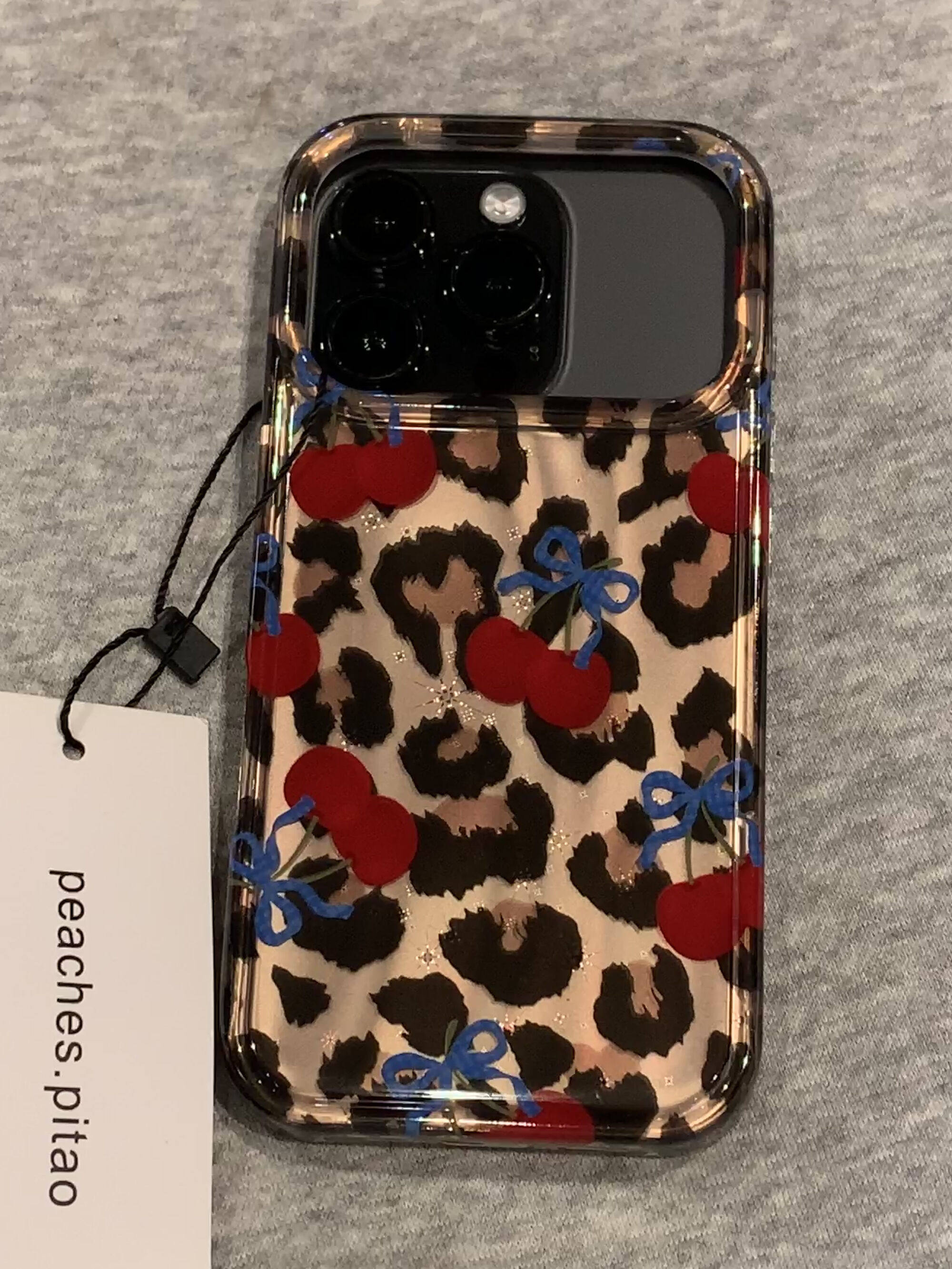Ameigas Winter Cheetah Cherry Case - Insta-Fashion Design with Detachable Chain & Dual-Layer Hard Shell