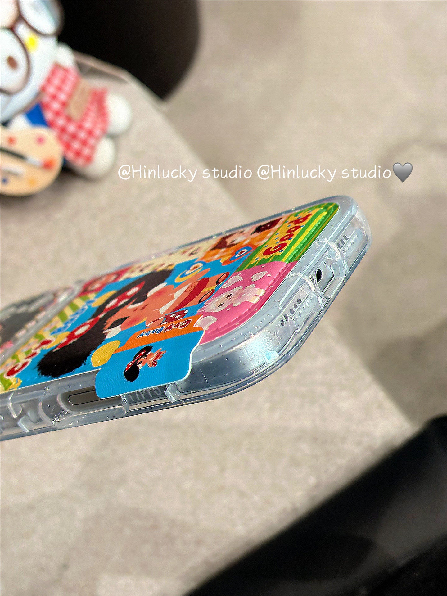 Ameigas Tearful Puff-Pop Case - Cartoon Crying Baby with Floral Leather Camera Accent