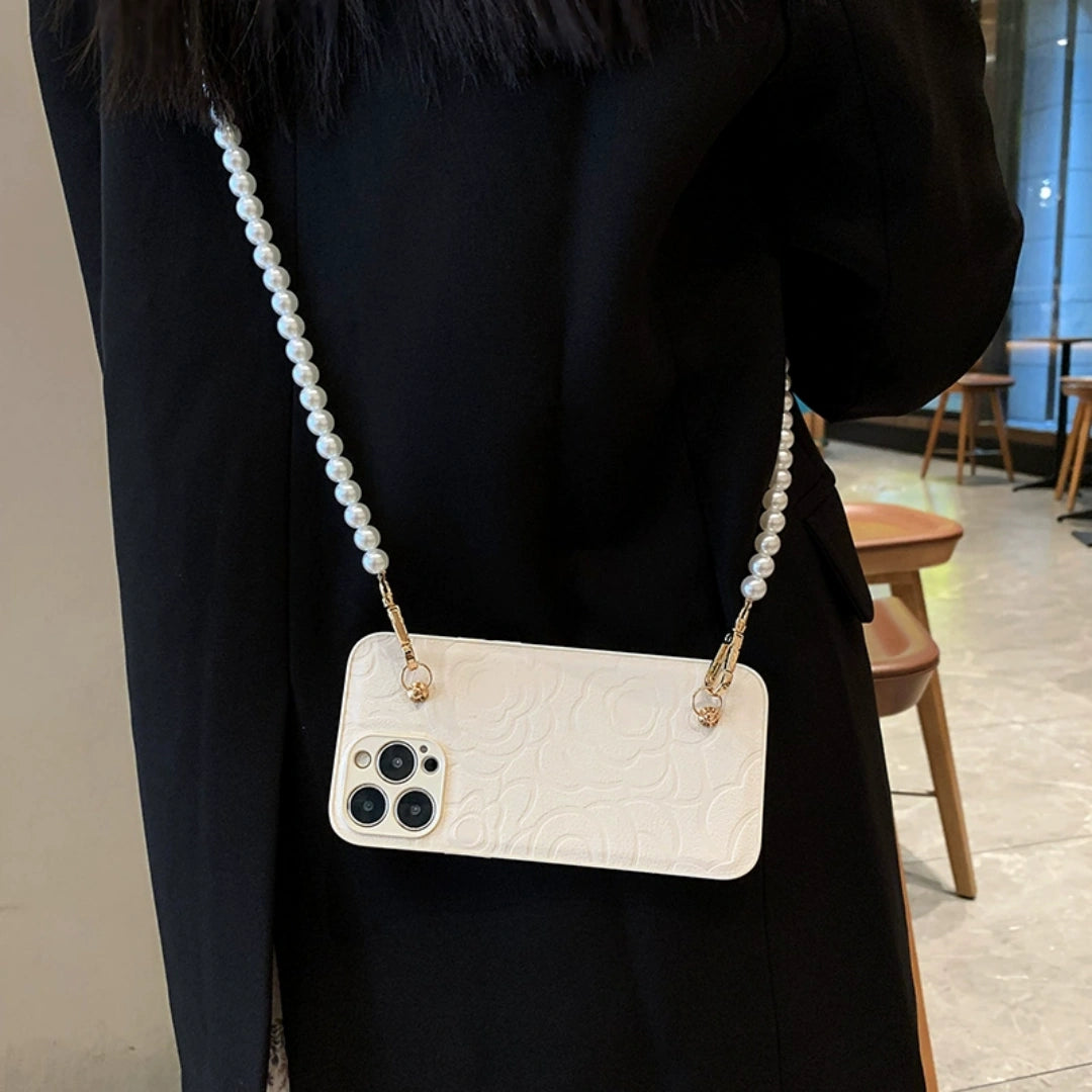 Ameigas Luxury Camellia iPhone 17 Pro Max Case – Designer Inspired Pearl Strap, Soft Silicone Full Cover